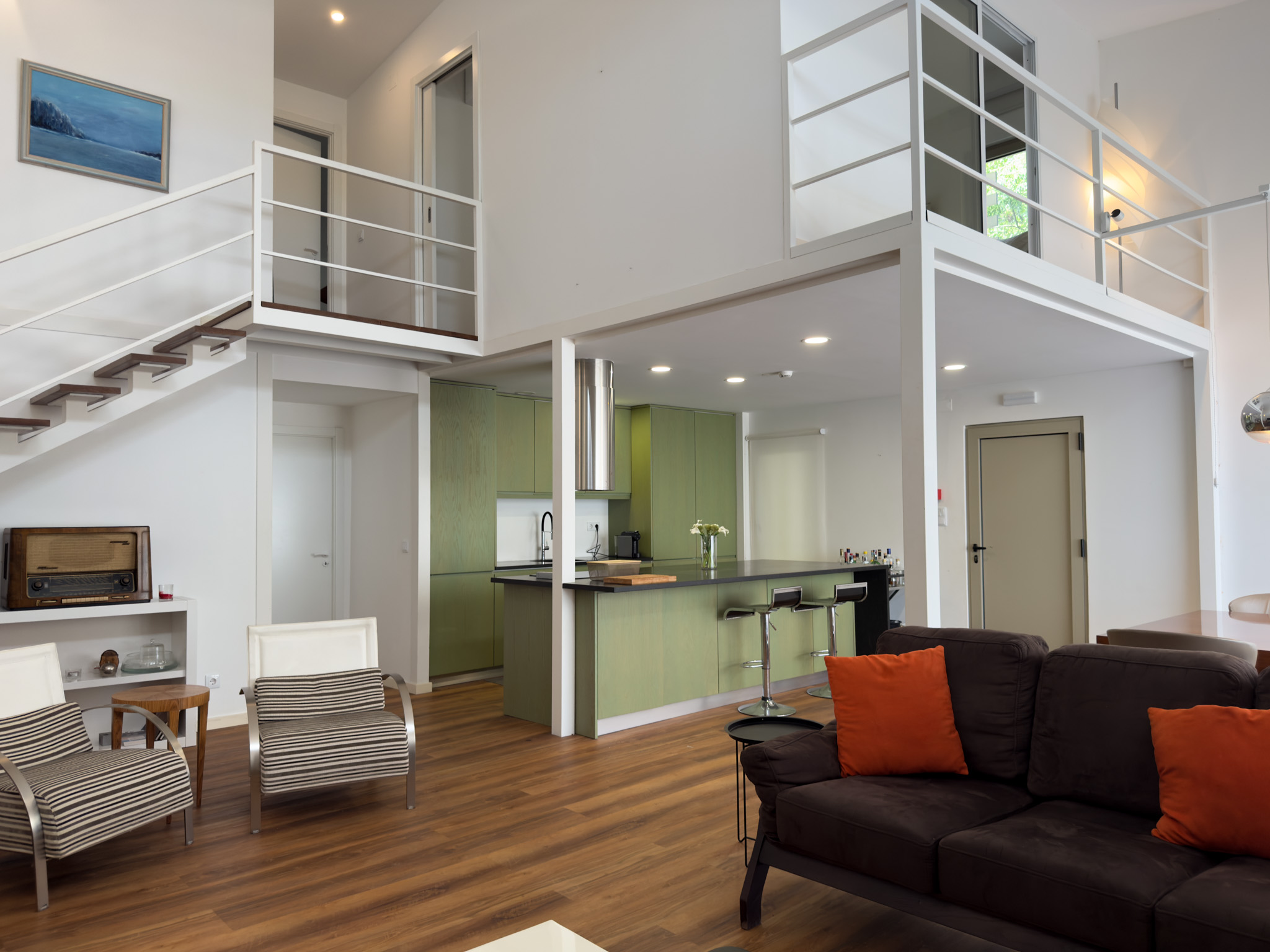 Sala e cozinha de uma das casas de 3 quartos